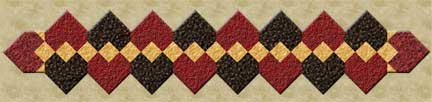 paper-piece quilted heart tablerunner