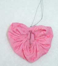 Shaping a heart fabric yo-yo