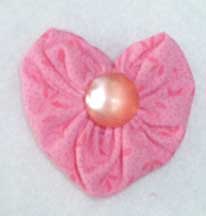 Heart-shaped fabric yo-yo