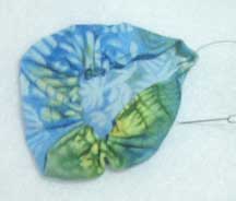 Gathering a square fabric yo-yo